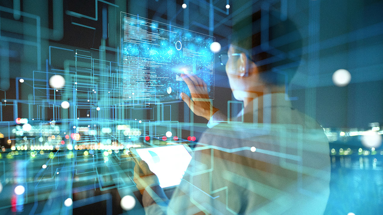 man with computer with lights overlay